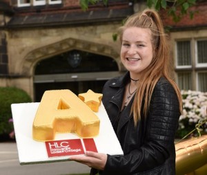 Harrogate Ladies' College pupil with A Star cake