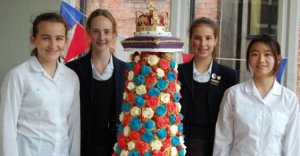 Harrogate Ladies’ College pupils with their Queen’s 90th Birthday cake