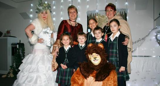 Mrs Gravestock, Mrs Skinner, Mrs Finnegan and Mr Savile with pupils from Highfield Prep School