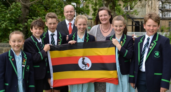 Mr James Savile, Mrs Juliet Burd and the six Highfield Prep School pupils that visited Uganda this year