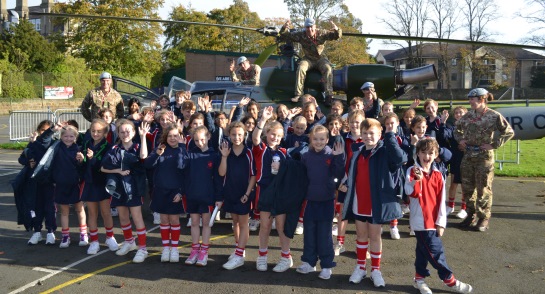 Pupils at Highfield Prep School and the Gazelle Helicopter