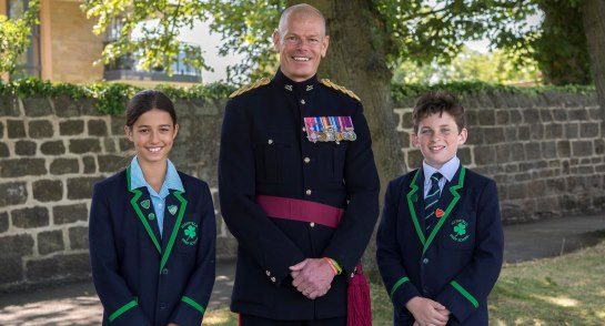 Lt Col Hall with Head Girl Alexa Burrell and Head Boy William Tracy
