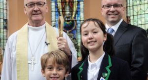 The Right Reverend Nick Baines, Bishop of Leeds; Head of Highfield, Mr James Savile; Head Boy, Hugo May and Head Girl, Reewa Bennett