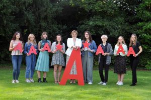 Sylvia Brett, Principal of Harrogate Ladies’ College and pupils celebrate achieving impressive A levels