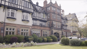 The beautiful main building of Harrogate Ladies' College in full daylight.
