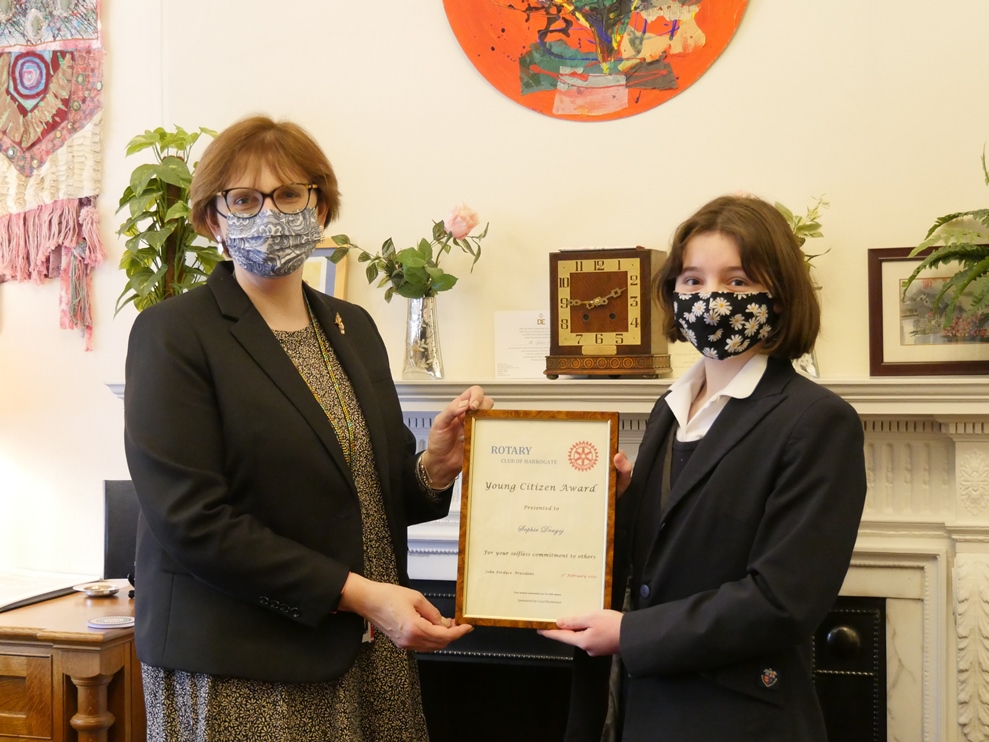 Sophie Dragoj, receiving her award from the Principal of Harrogate Ladies' College, Mrs Sylvia Brett