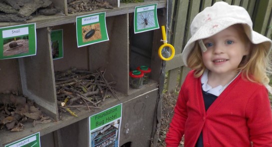 It's a Bug's Life! Foundation work on their bug hotel in the garden