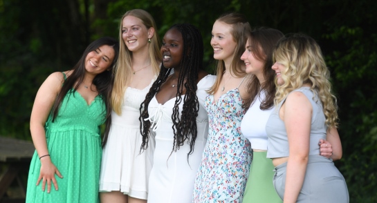 Upper 6 Leavers at Harrogate Ladies' College enjoy a glass of fizz on the lawn