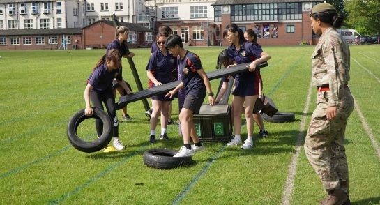 Lance Corporal Elychia Watson leads Harrogate Ladies' College pupils to hone their elite army skills