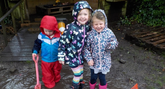 Puddle and Strife for Holiday Club! Children attending the EYFS Holiday Club at Highfield Prep School splash in puddles