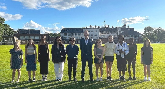 The talented epic runner Sam Boatwright alongside winners and attendees at the Harrogate Ladies’ College Sports Presentation Evening