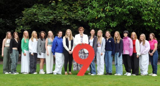 Principal Sylvia Brett with students celebrating their results today