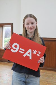 Phoebe Turner celebrates her 9s in Textiles and PE.