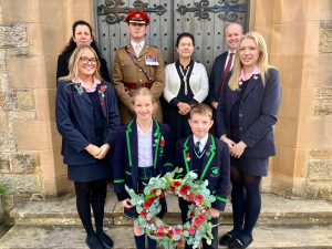 Staff, students and guest speakers celebrate Remembrance Day at Harrogate Ladies' College.