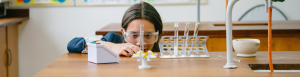 Student in the 1 Year GCSE Programme at Harrogate Ladies' College doing a science experiment.
